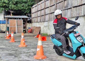 Tips Berkendara Aman saat di Jalan Beton