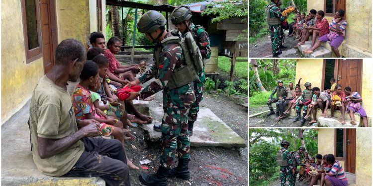 Tak Ada Jarak, TNI Bagikan Baju Baru untuk Warga Papua di Waris