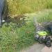 Mobil Masuk Parit Usai Tabrak Motor di Sentani